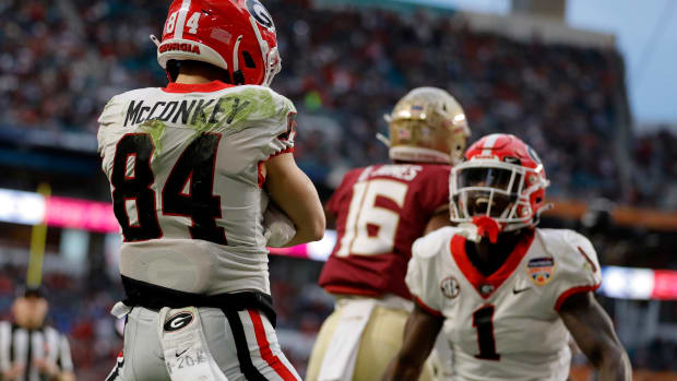 Dec 30, 2023; Miami Gardens, FL, USA; Georgia Bulldogs wide receiver Ladd McConkey (84) reacts after scoring a touchdown against the Florida State Seminoles during the first half in the 2023 Orange Bowl at Hard Rock Stadium. Mandatory Credit: Sam Navarro-USA TODAY Sports  